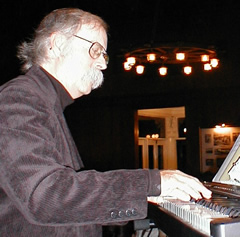 Photo of pianist Dick Bay in action